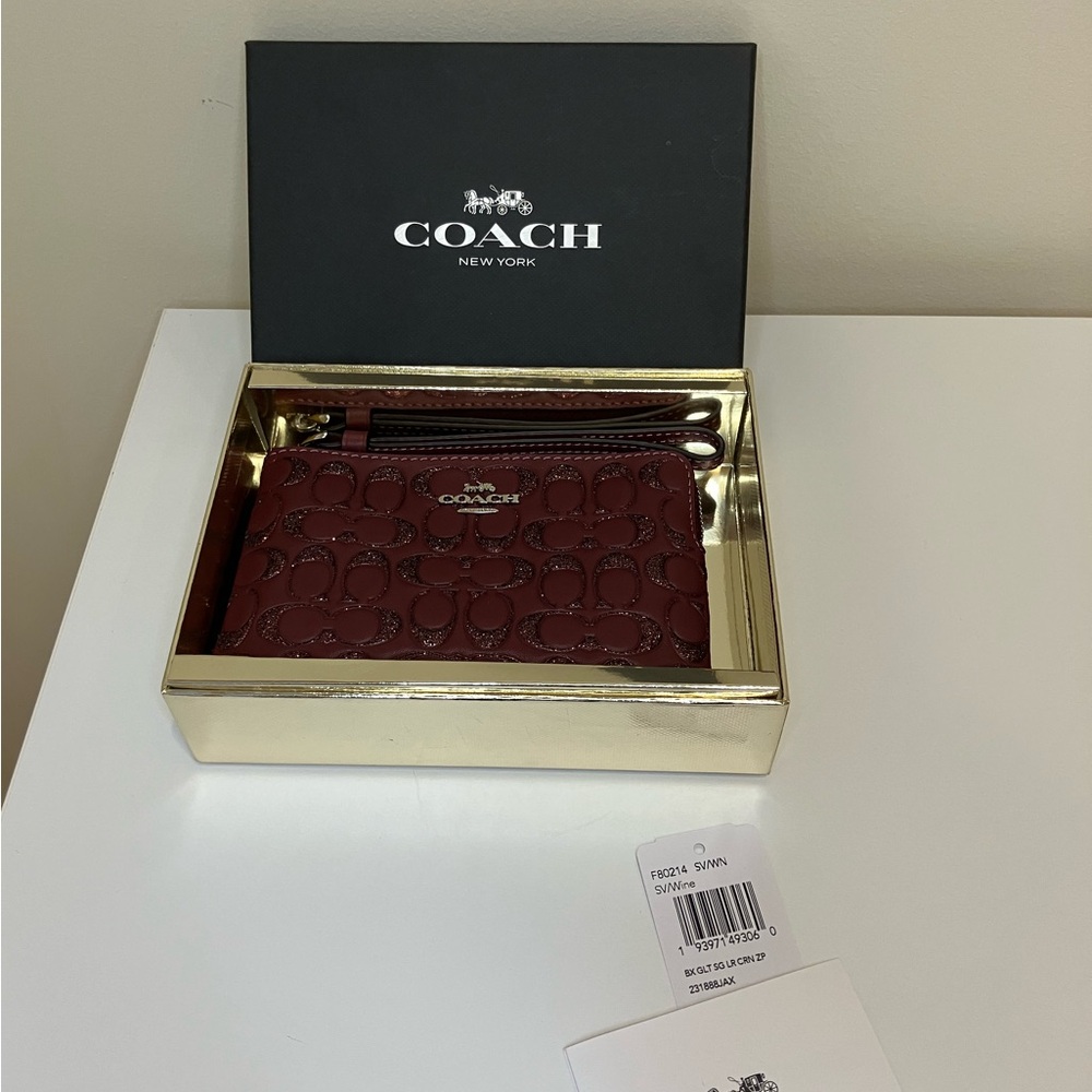 Coach Corner Zip Wristlet In Glitter Signature Leather Wine Burgunday